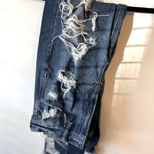 American Eagle ripped blue jeans